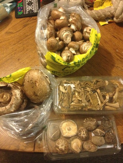 The mushrooms for this week's recipes. 2.5 lbs crimini. 2.0 lbs portobello. 0.5lbs dried porcini. and 0.1 oz dried shiitake.
