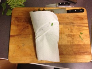 Just like a tiny infant, bring all of the leaves together and tightly wrap in the paper towel. 