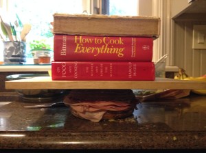 Layer meats and cheeses, and remaining 1/3 of tapenade. Weight sandwich and press for 30 minutes. I'm using the Holy Trinity: McGee, Bittman and Child.